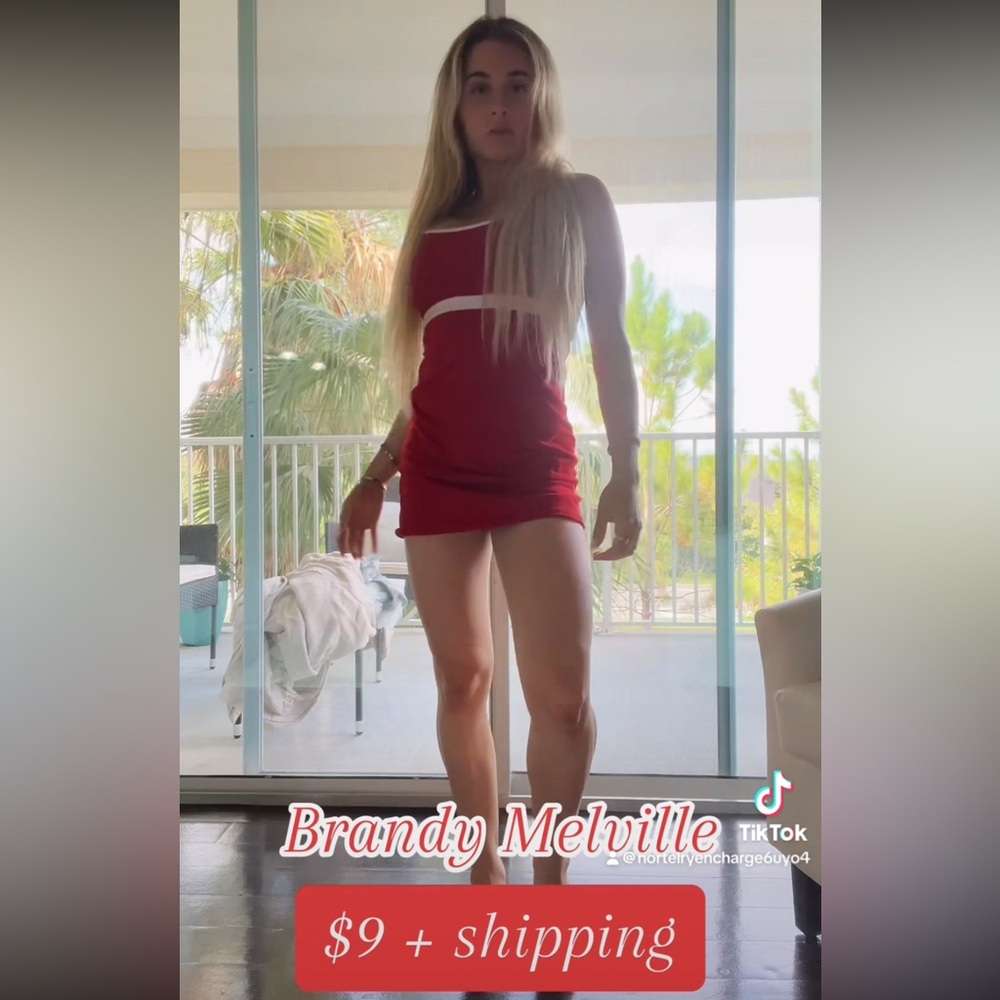 simple red summer dress slightly hugs the body